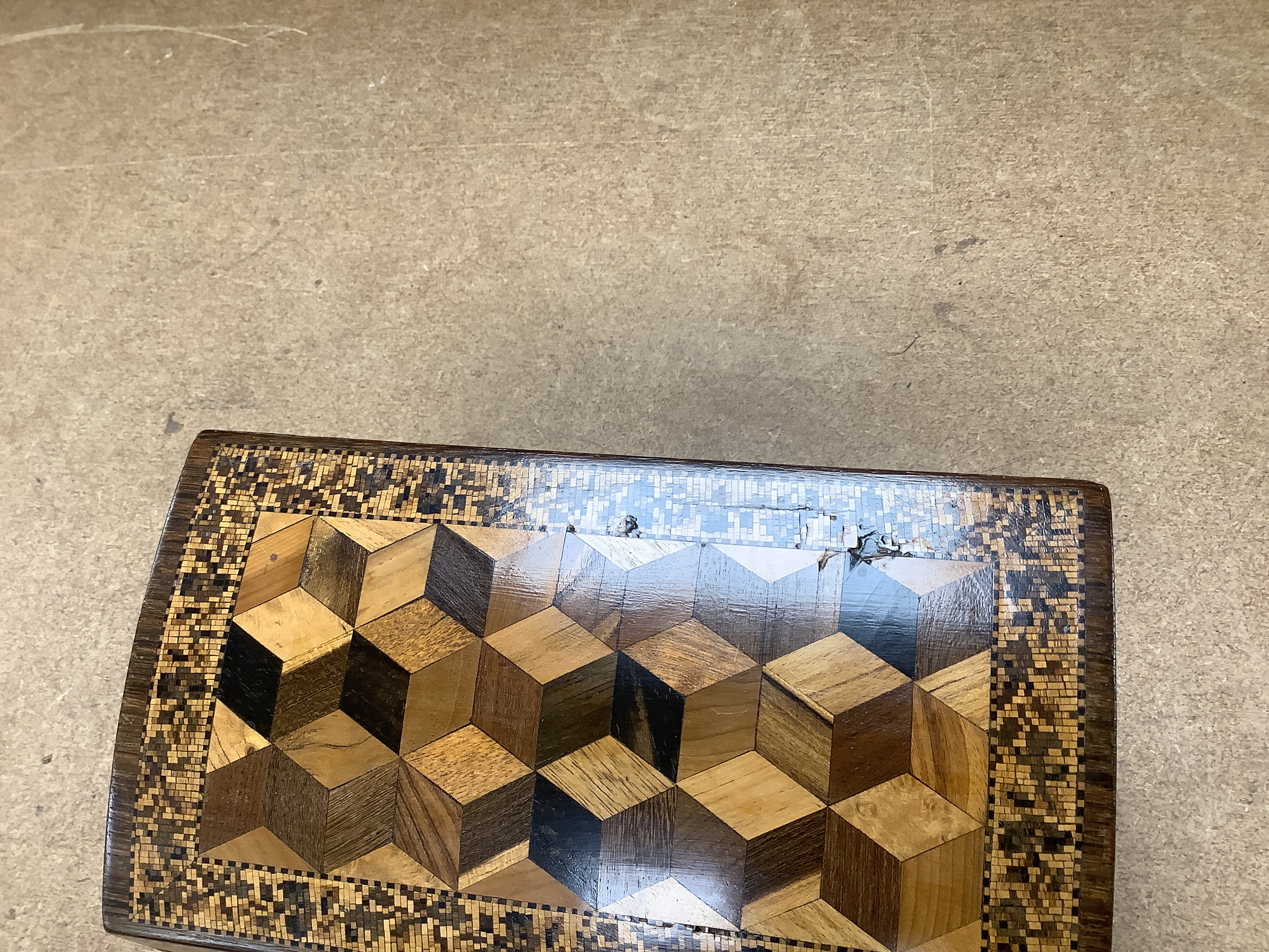 A Tunbridgeware specimen perspective cube marquetry stationary box, 21cm wide, 11cm deep, 13cm high